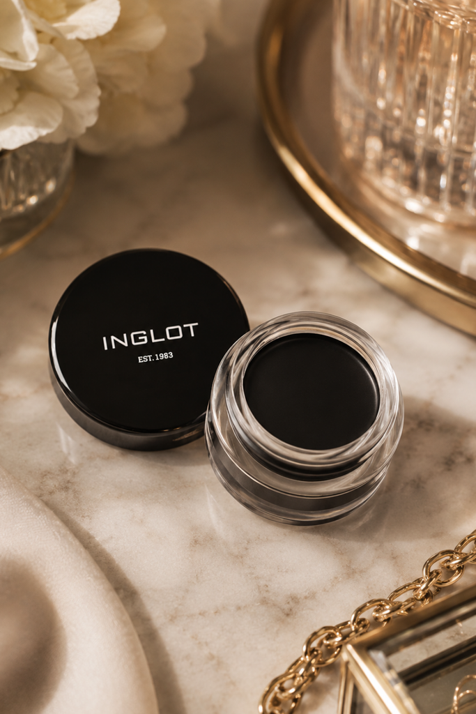 Bridal makeup artist applying gel eyeliner for a sharp winged liner look